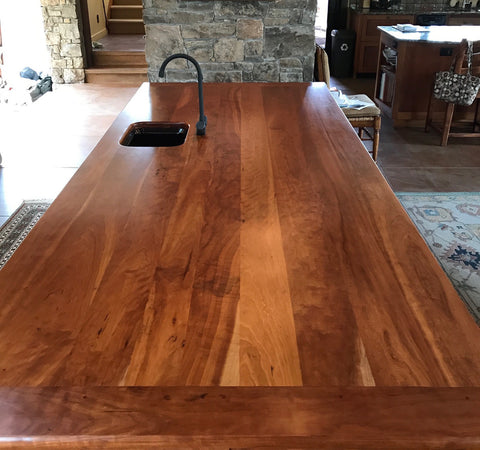 cherry wood bar top after applying kunos by livos