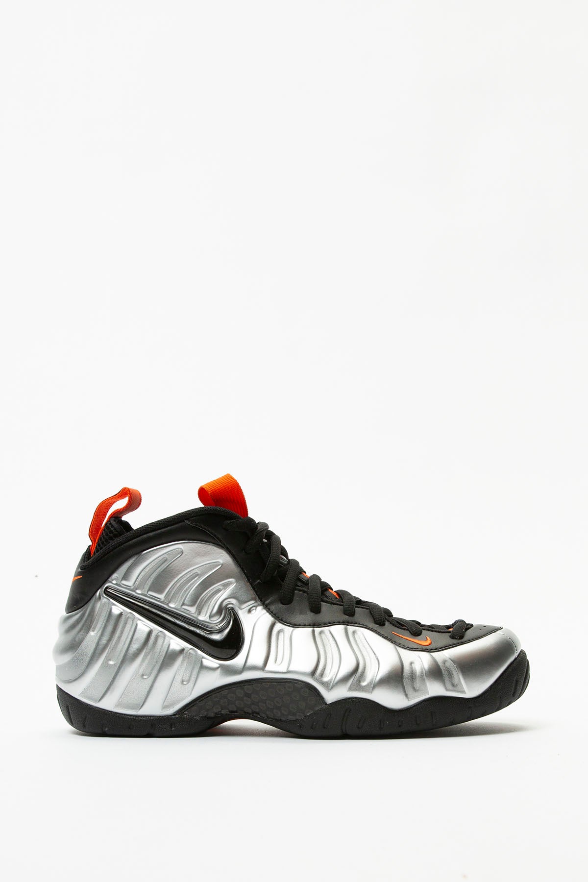 silver black and orange foamposites