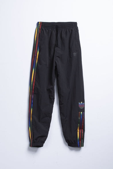 half striped adidas pants