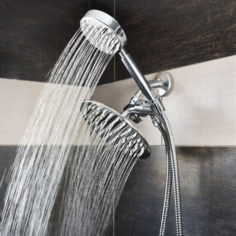 The best dual shower head is spraying water in a black and white tile shower