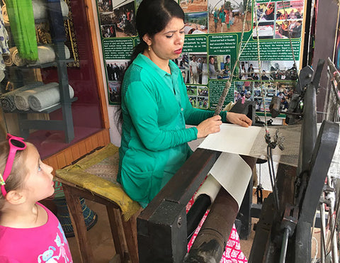 Blind girl working hand loom Nepal