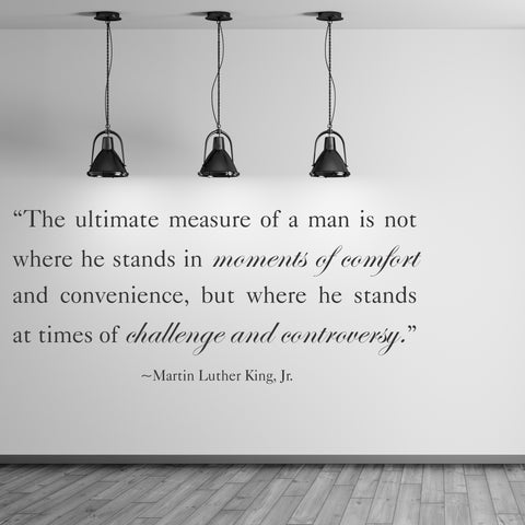 A large Black History Month wall display using a Simple Stencil removable decal that reads: “The ultimate measure of a man is not where he stands in moments of comfort and convenience, but where he stands at times of challenge and controversy.” Martin Luther King, Jr.