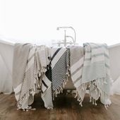 fouta towels hanging on clawfoot tub - highest quality cotton for best turkish towels