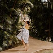 turkish towel worn by woman in bikini for travel to beach or resort