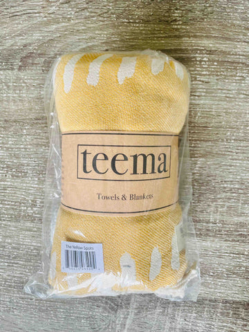 teema towel yellow spots