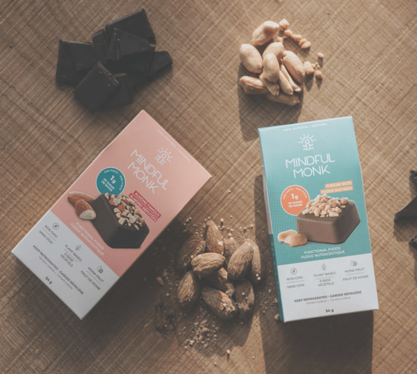 two packs of mindful monk with nuts and chocolate.