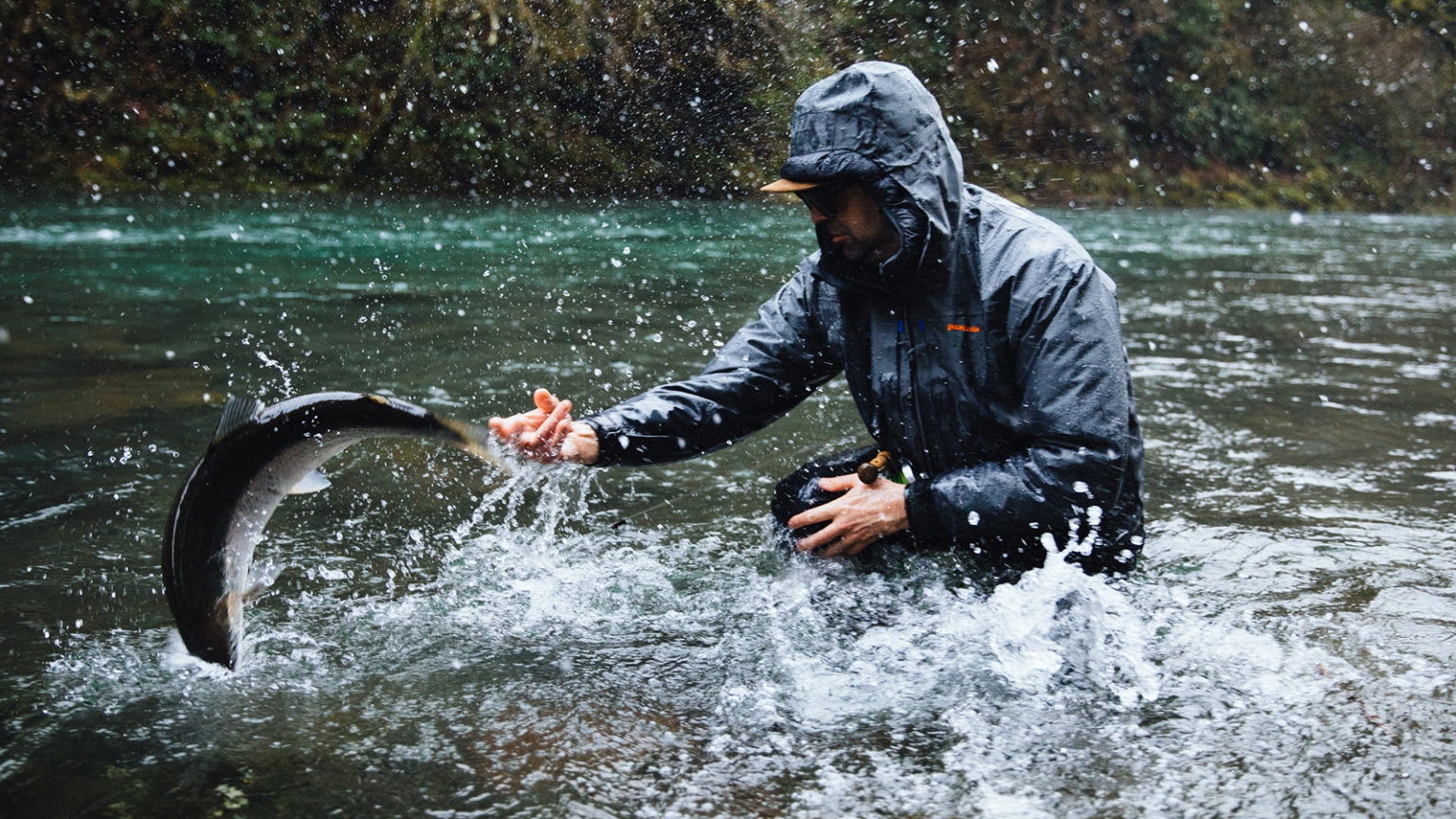 Hard to catch, harder to hold. Jeff Hickman fumbles the release of a wild steelhead in northern Oregon.