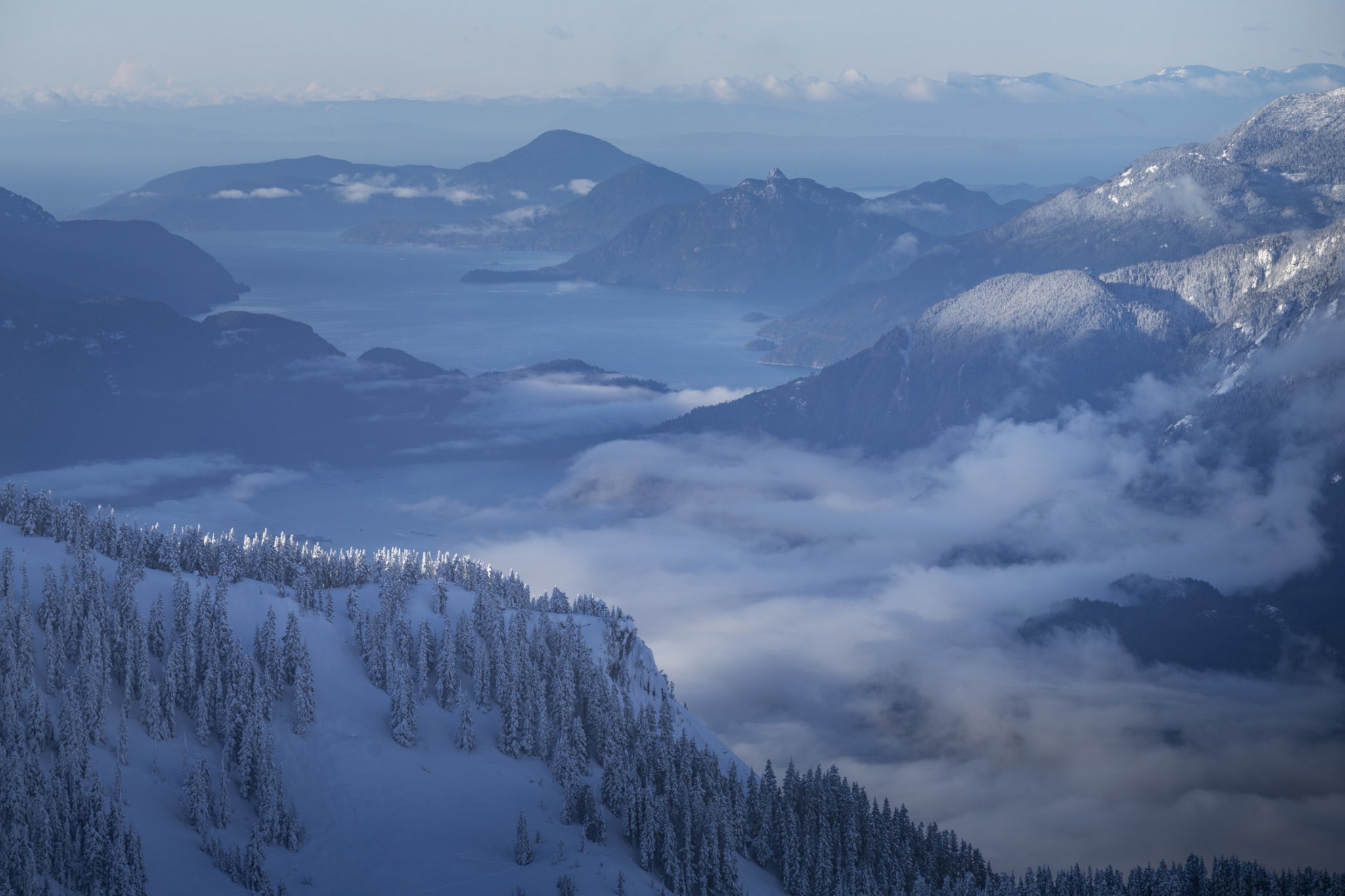 Early morning sun awakens the Howe Sound in Sḵwx̱wú7mesh territory.