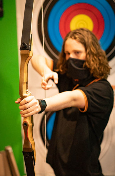 Boy Holding Recurve Bow