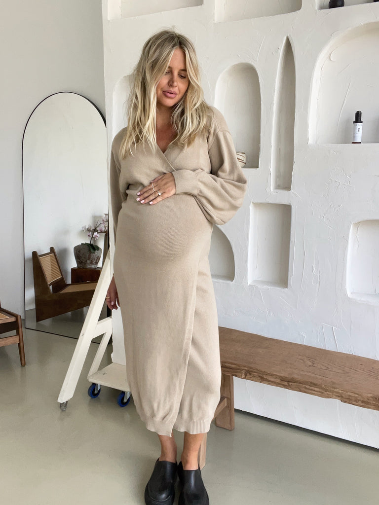 Pregnant Woman wears Knit Cotton Wrap Maternity Dress (Wheat)