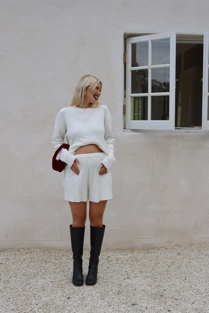 Lisa wears the Catalina Jumper and Knit Shorts - a chic maternity set