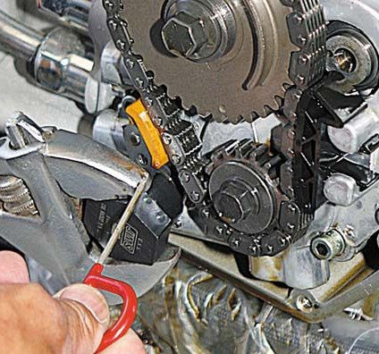 Réparer la distribution du tensionneur double came Harley Davidson
