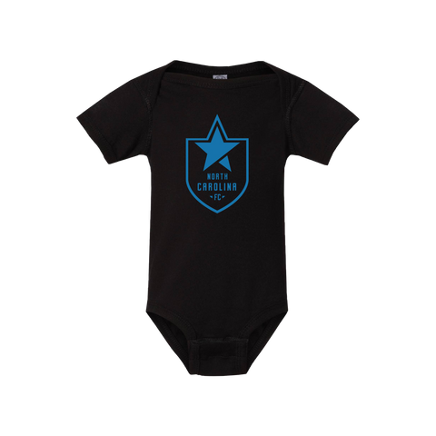 https://cdn.shopify.com/s/files/1/1606/8227/products/NCFC_Black_Onesie_480x480.png?v=1679325455