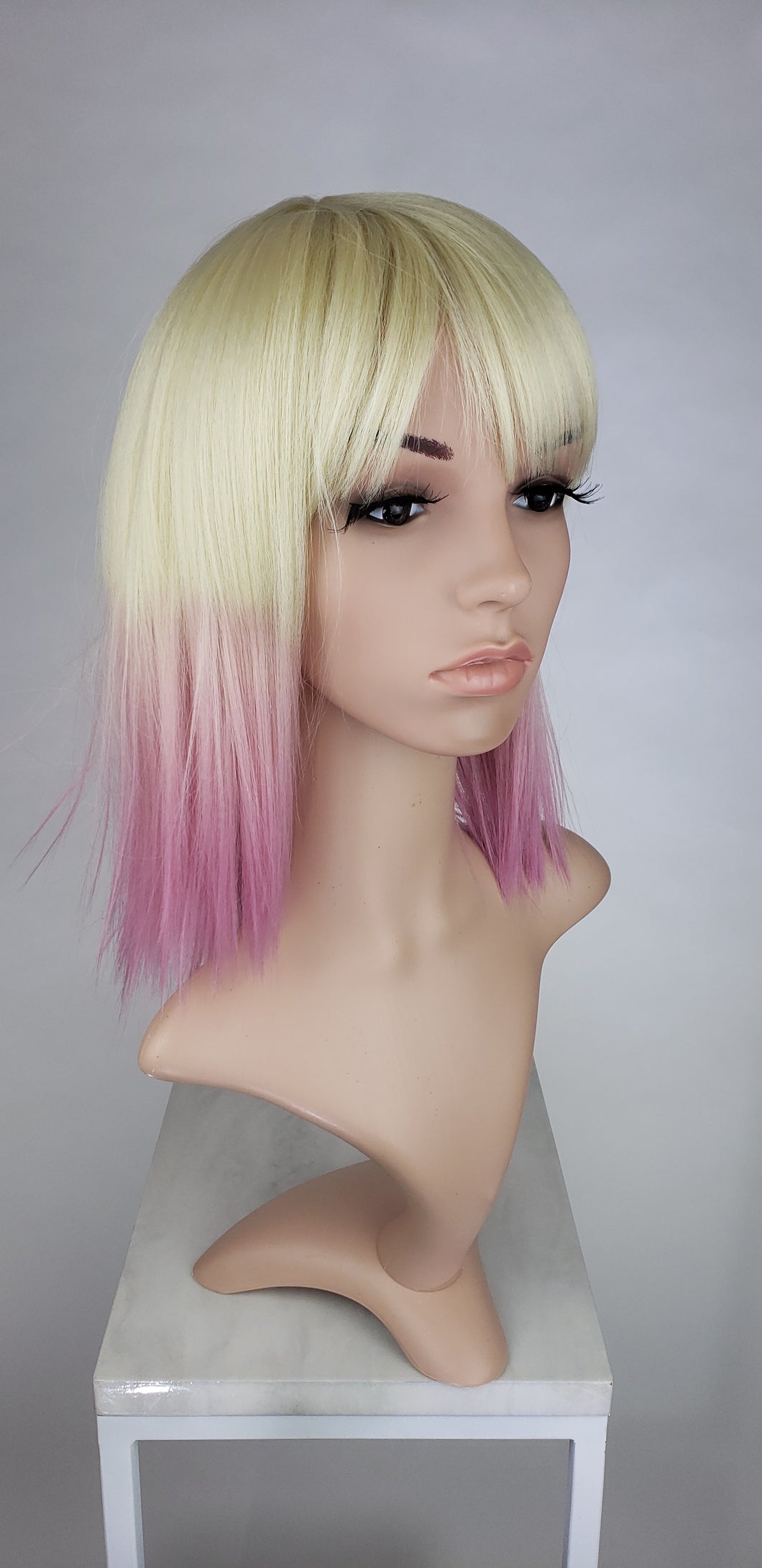 Blonde With Pink Tips Medium Length Straight Bob With Bangs