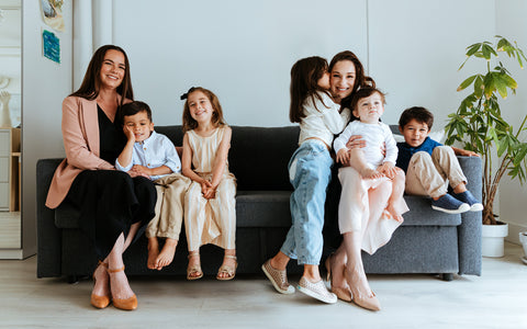 Bobbie cofounders Sarah Hardy (L) and Laura Modi (R) with their children