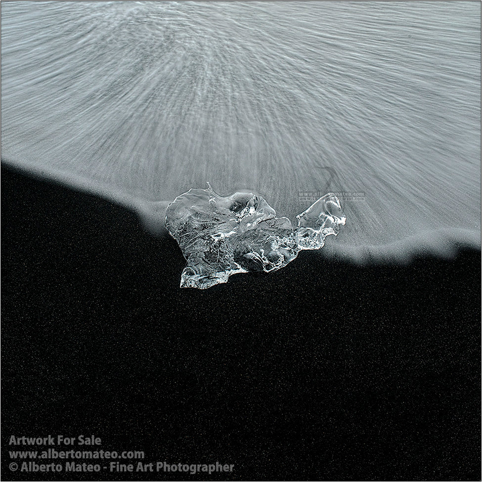 Ice chunk and wave, Diamond Beach, Iceland.