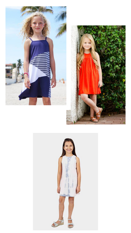 three tween girls wearing a navy beach cover up, a orange sun dress and a white romper dress