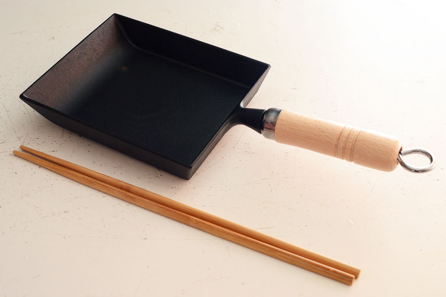 To cook Tamagoyaki into a beautiful rectangle, use a Tamagoyaki-ki (frying pan for making rolled eggs).