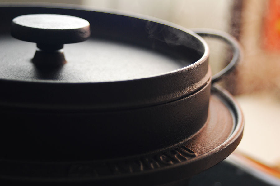 Keep the heat on medium and when it comes to a boil and steam comes out through the lid, reduce the heat to low and let it cook for 15 minutes.