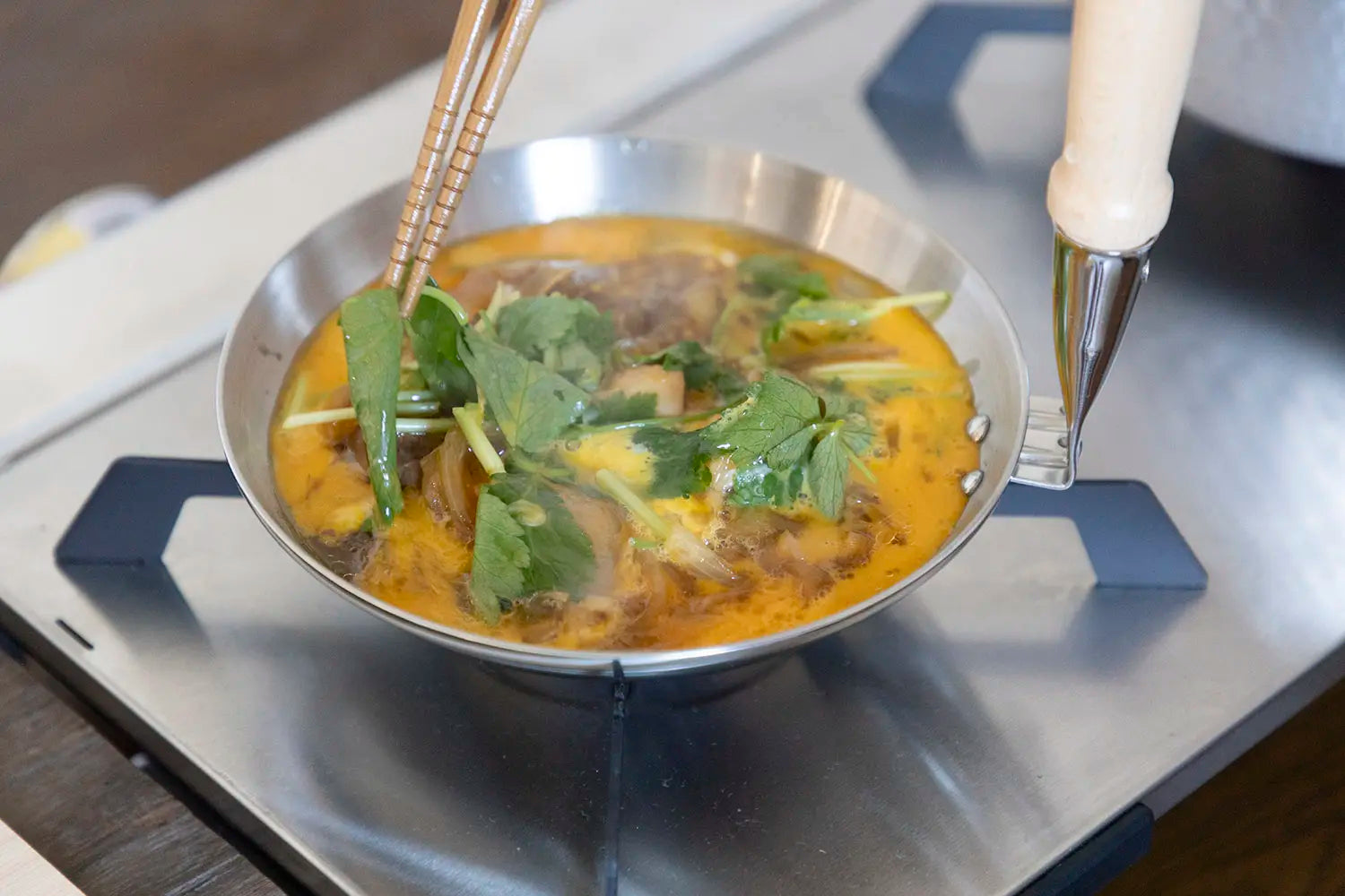 Simmering in an oyakodon pan