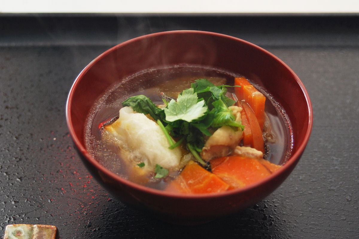 Ozoni is a kind of soup containing Japanese white radish, carrot, chicken, Mochi (rice cake) or whatever you like.