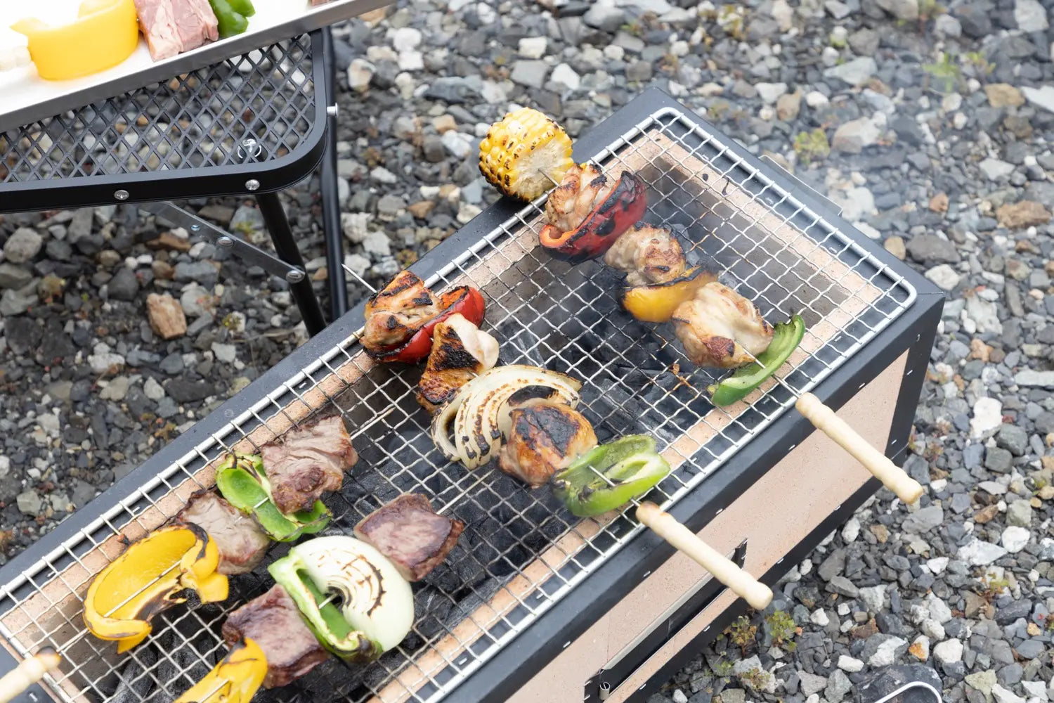 Four kebabs on a Kaginushi grill