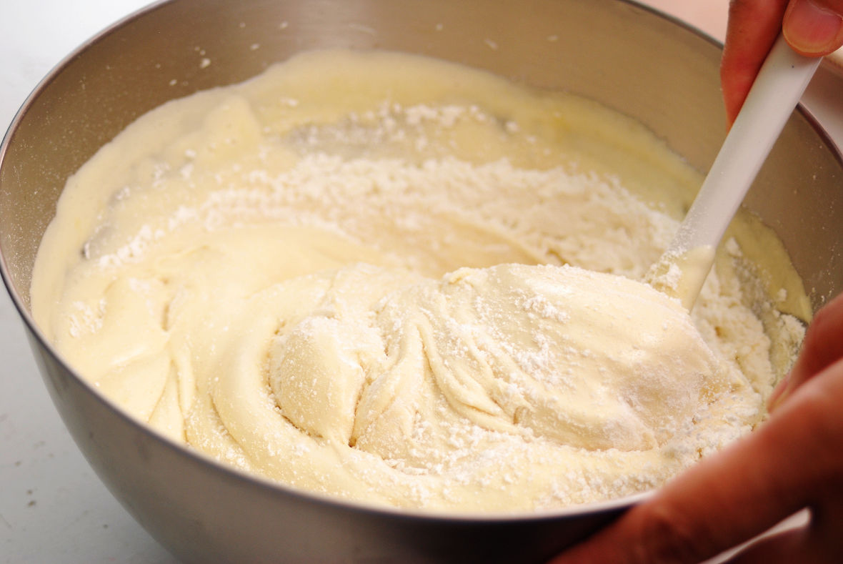 Sift the cake flour and mix it with the batter gently and slowly with a spatula.