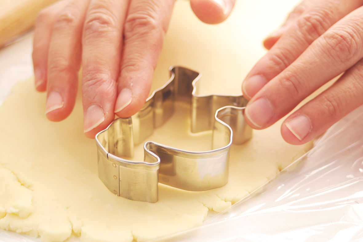 Mold the dough with cookie cutters.