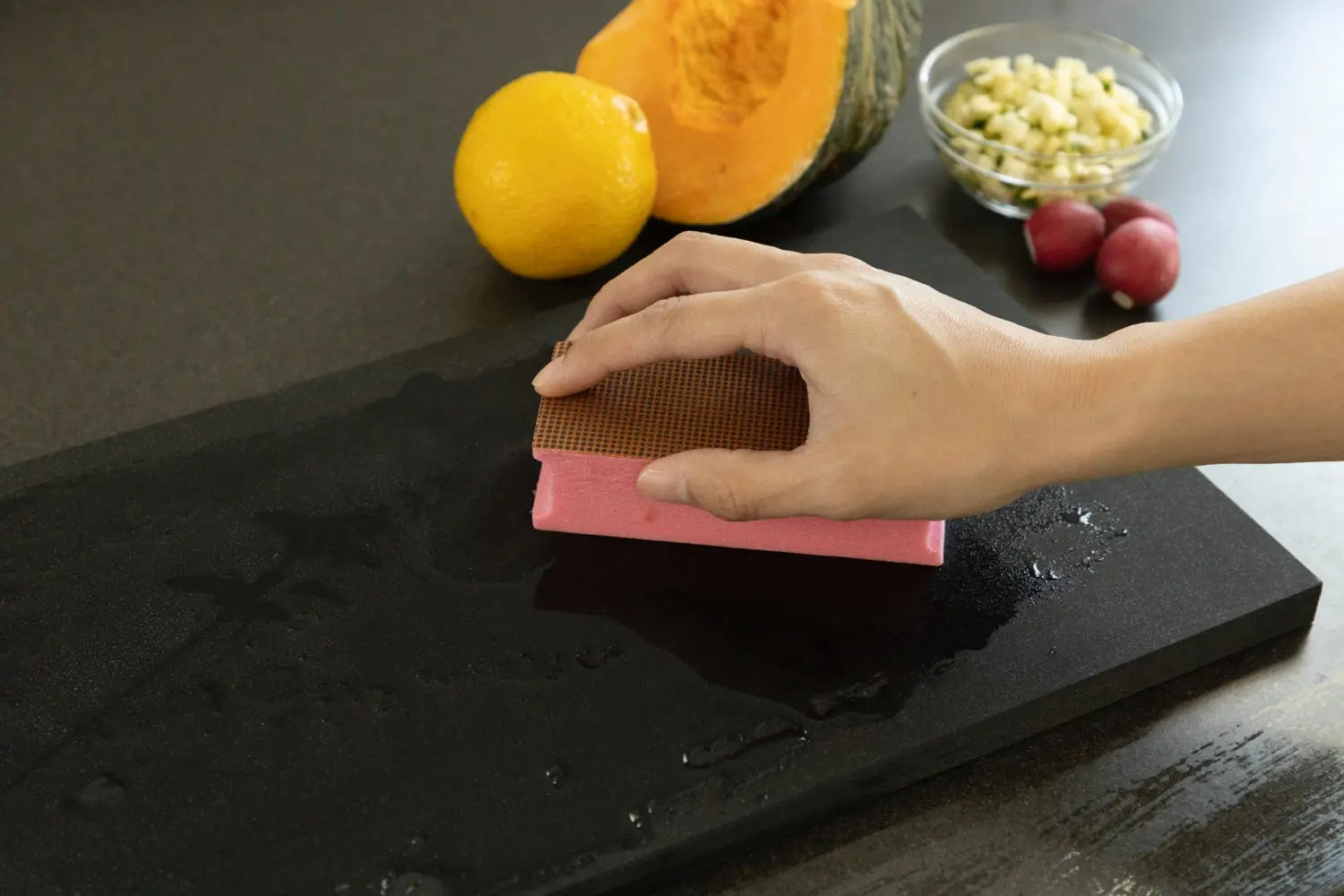 https://cdn.shopify.com/s/files/1/1610/3863/files/Parker_Asahi_Cookin__Cut_Synthetic_Rubber_Antibacterial_Cutting_Board_Black_HG8A9995.webp?v=1691560745