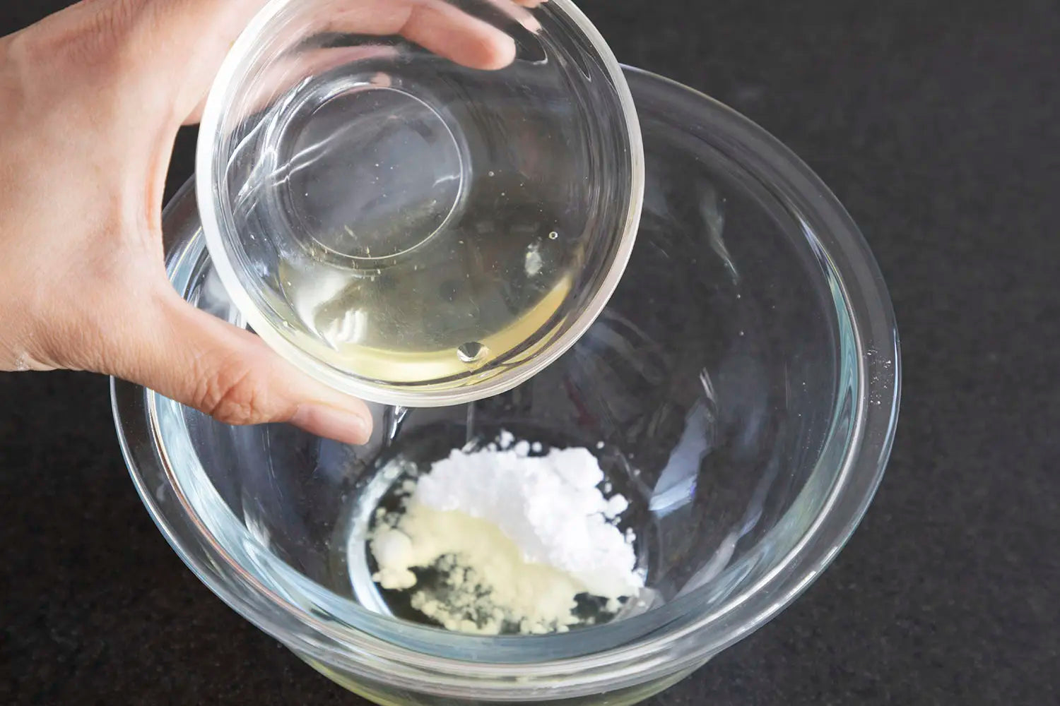 Add egg white to powdered sugar