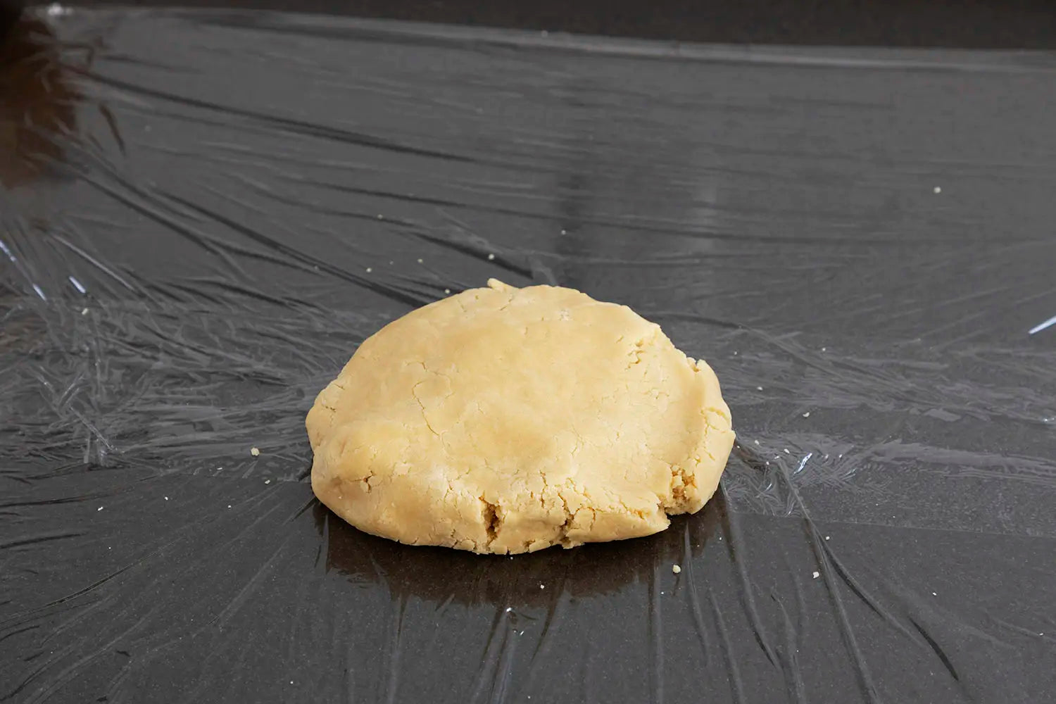 Placing dough on countertop