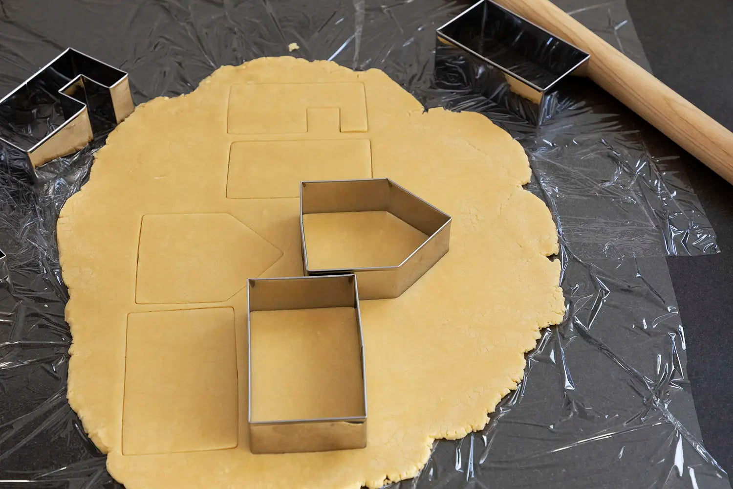 Cutting the cookie dough with TIGERCROWN cookie cutters