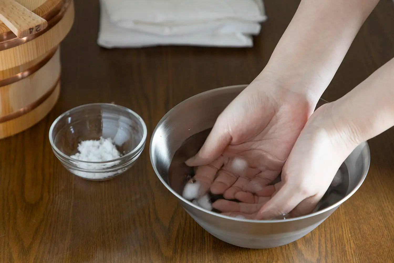 Cooling hands in ice water