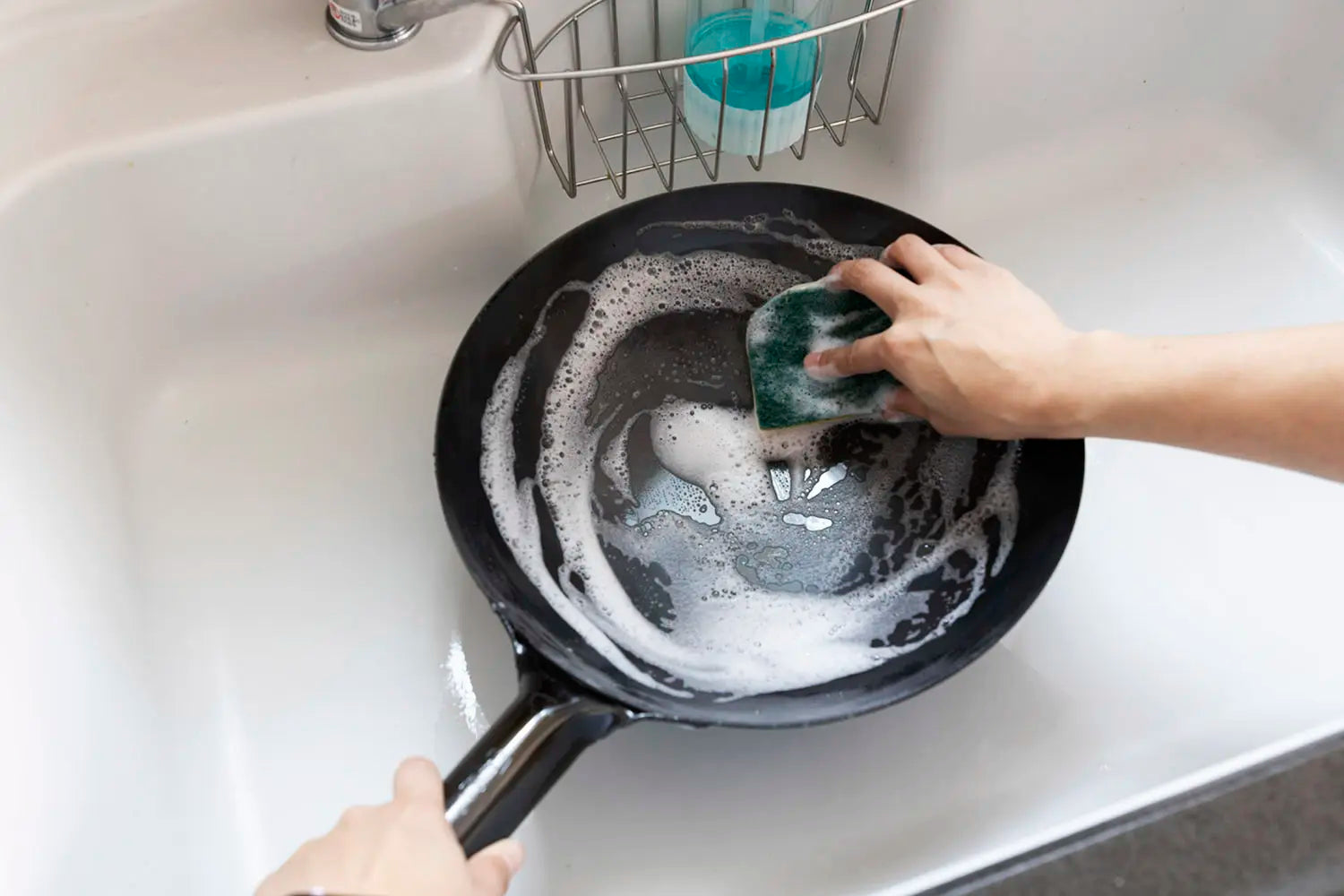 Washing the wok again after removing anti-rust coating