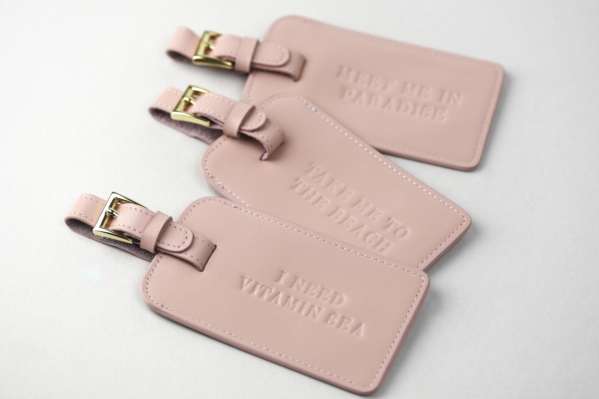 pink leather luggage tag