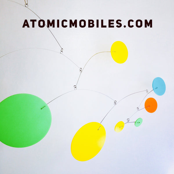 MOD Mobile en verde lima, amarillo, naranja y azul agua de AtomicMobiles.com