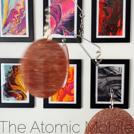 The Atomic Mobile Glitter + Glam Rose Gold Edition in kinetic motion - hanging art mobiles by AtomicMobilies.com