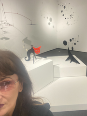 Debbie - owner and founder of Atomic Mobiles - at Calder exhibit in Chicago at the MCA in 2022