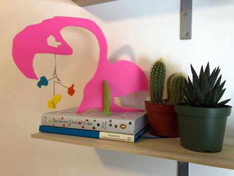 Flamingo modern art stabile with books and cactus and succulent plants by AtomicMobiles.com