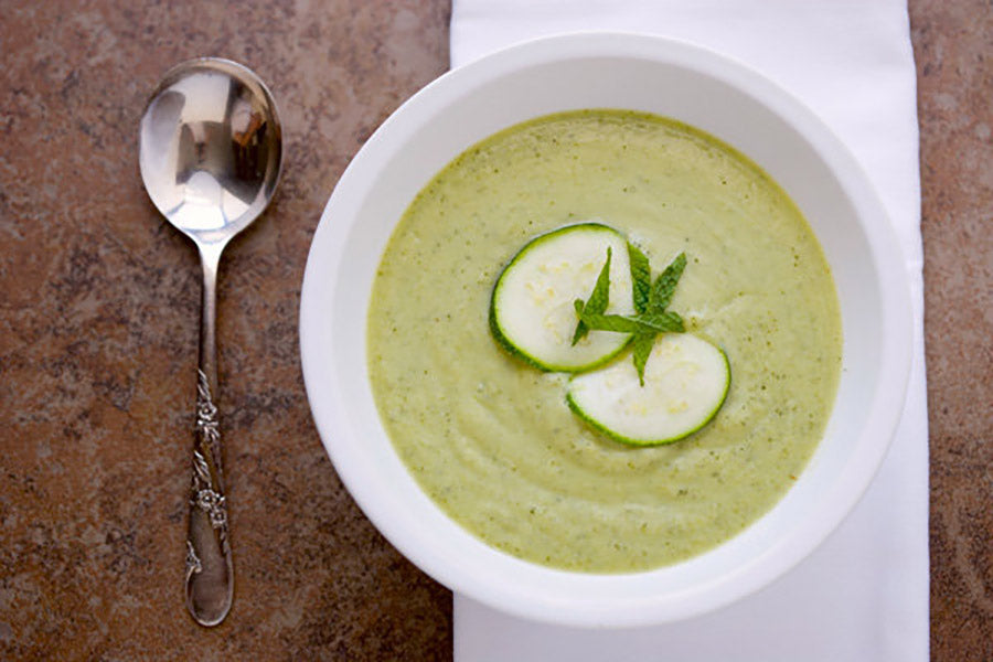 slow cooker soup with peas, zucchini and mint