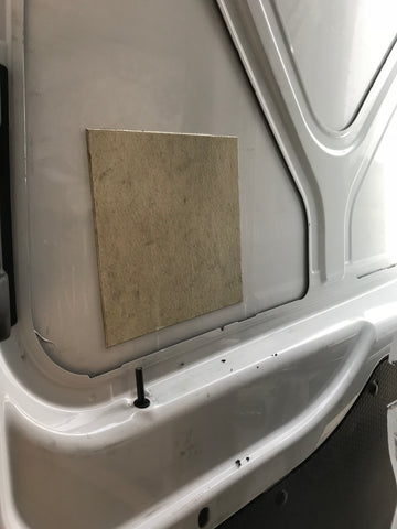 Ford Transit van conversion - Motion Windows aftermarket window installation - cutting locking plunger