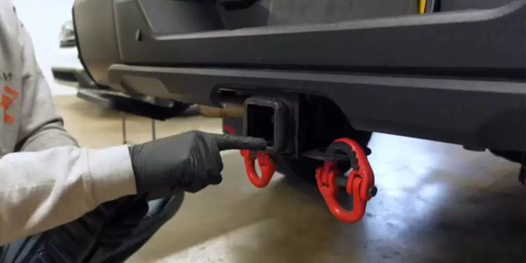 Remove the existing hitch (if applicable)