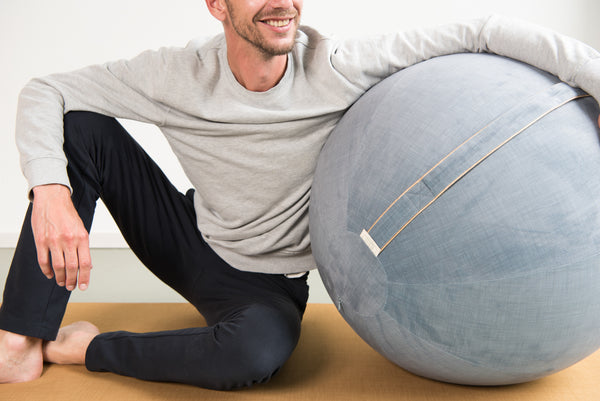 what an ergonomic sitting ball is good at your work station