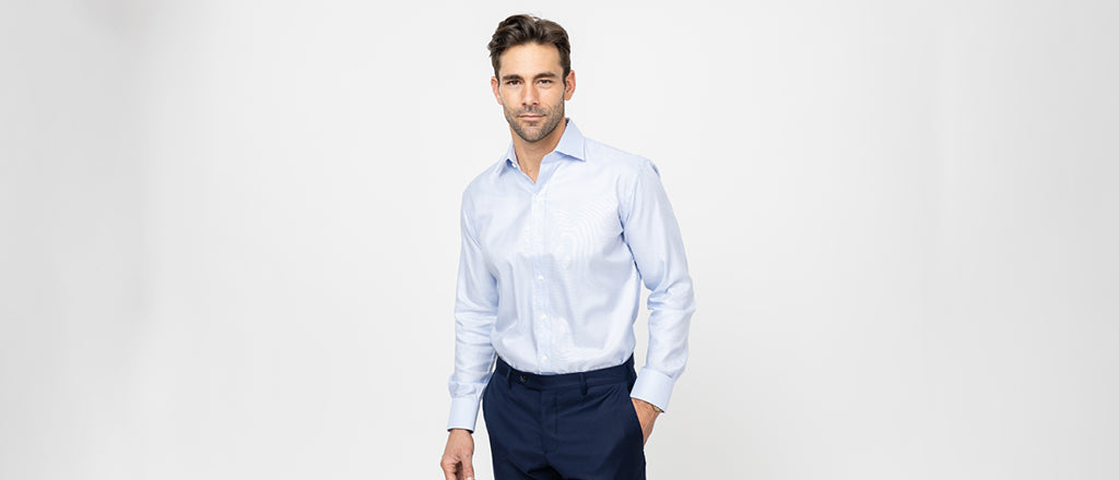 man wearing oxford dress shirt