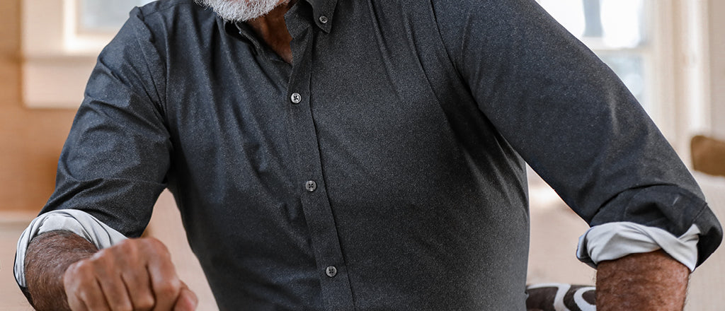 man wearing performance button-down shirt