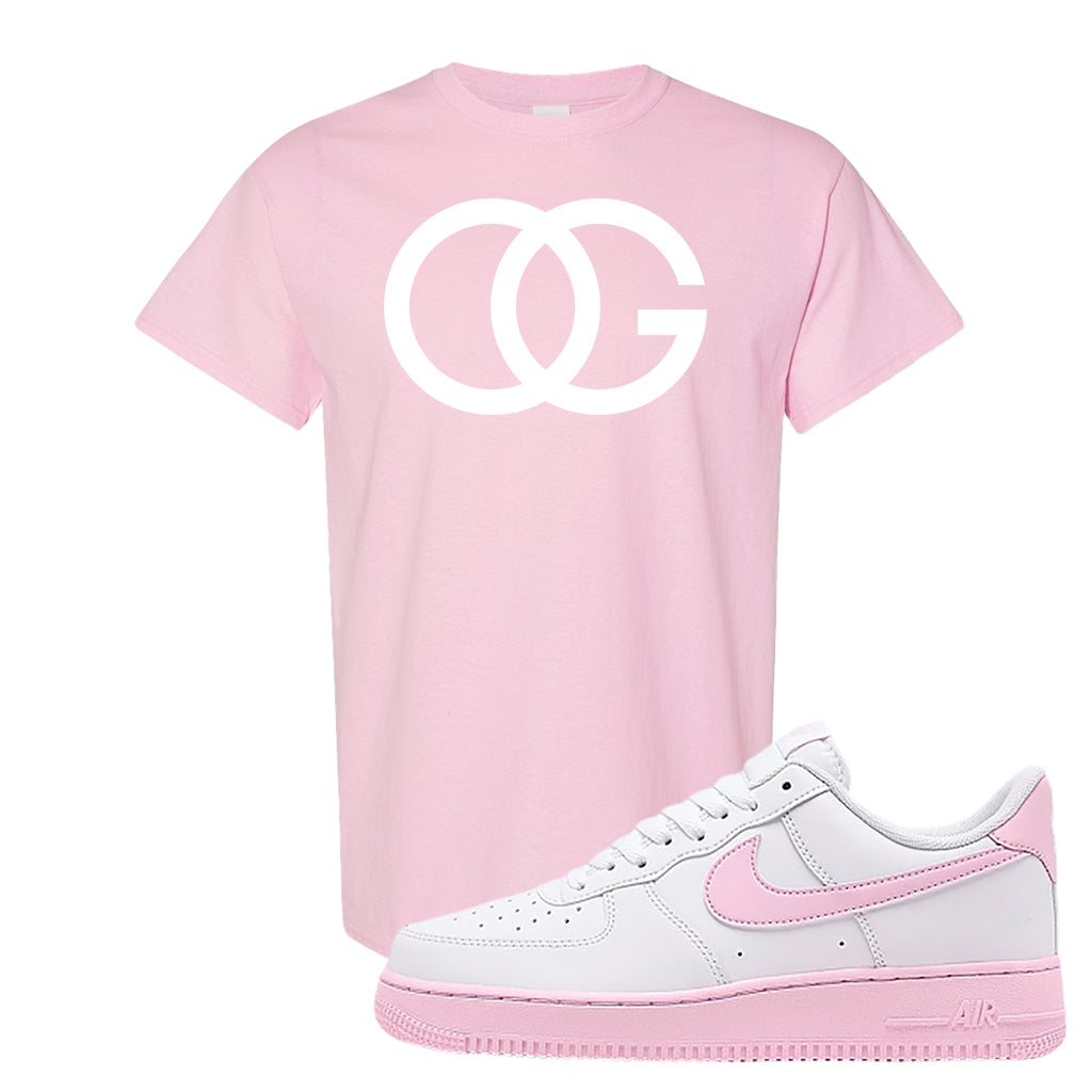 light pink and white nike shirt