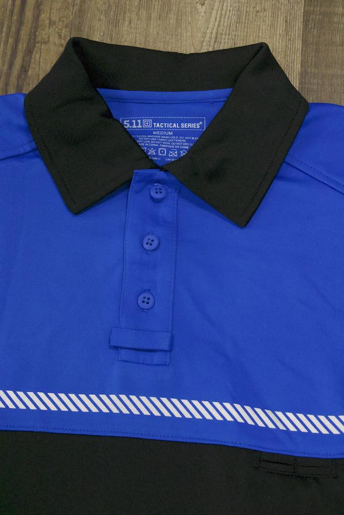 black and royal blue polo shirt