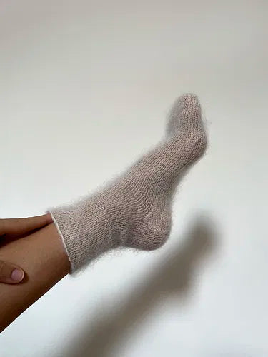 hand knit silk fuzzy sock pattern worn on foot
