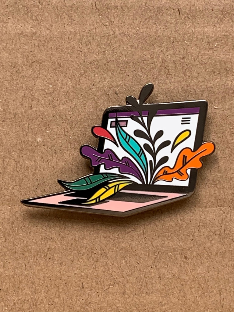 Shopify's laptop enamel pin