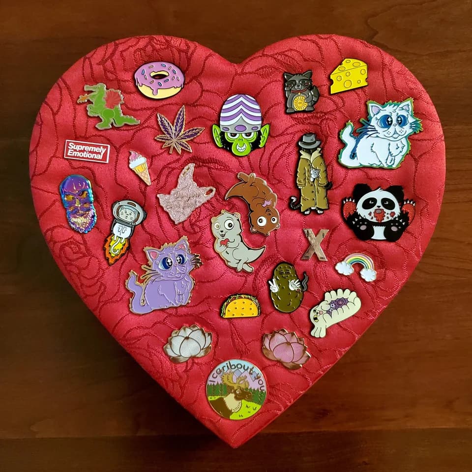 heart-shaped enamel pin display